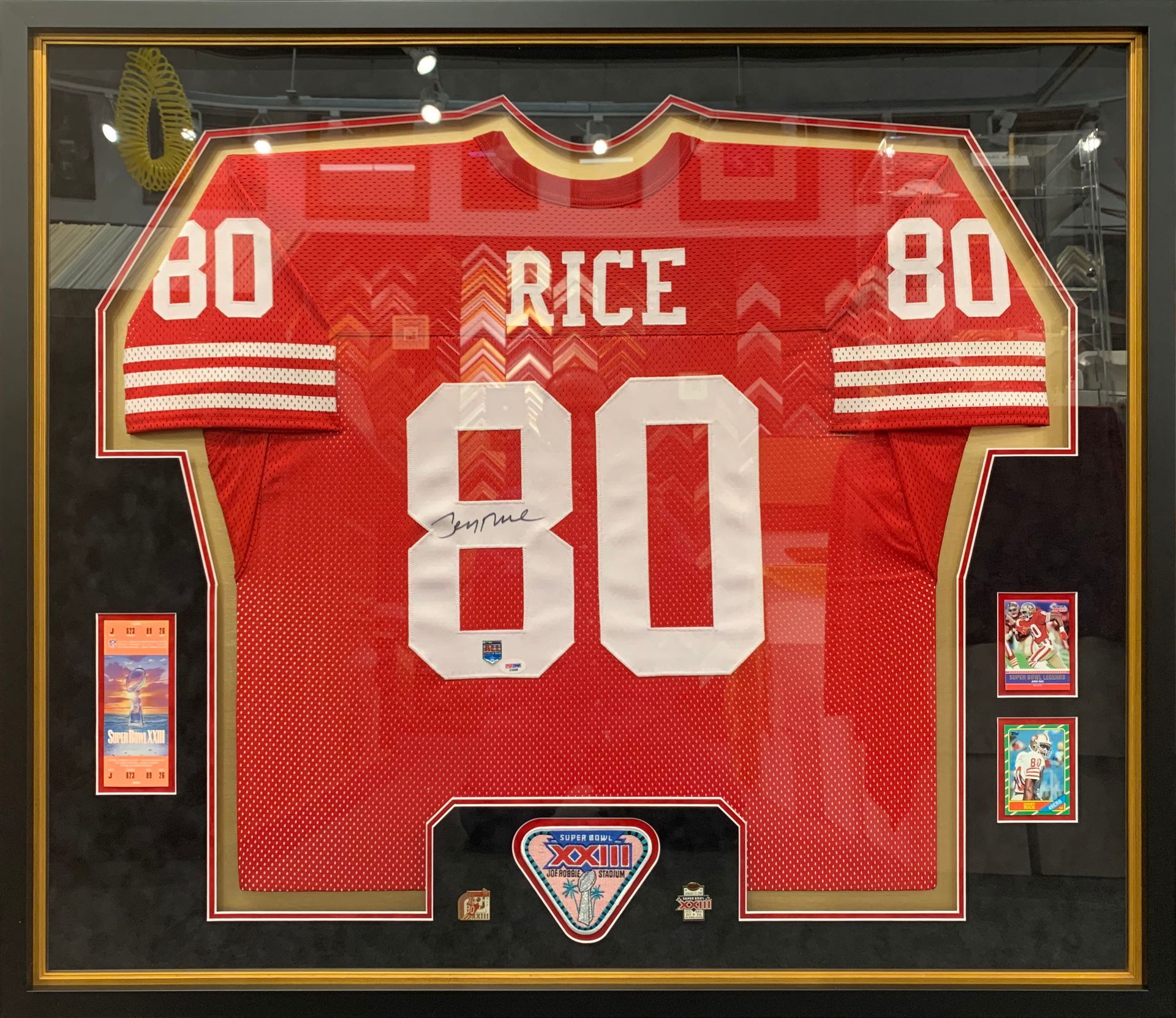 A red jersey with the number 80 on it