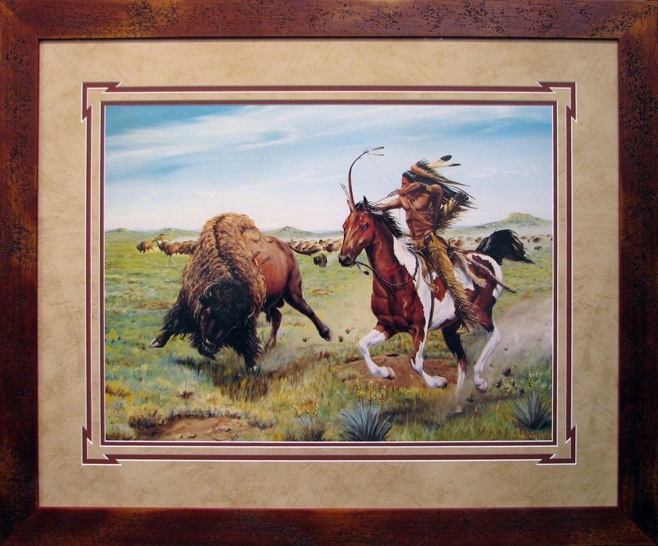 A painting of a man on a horse fighting a bison