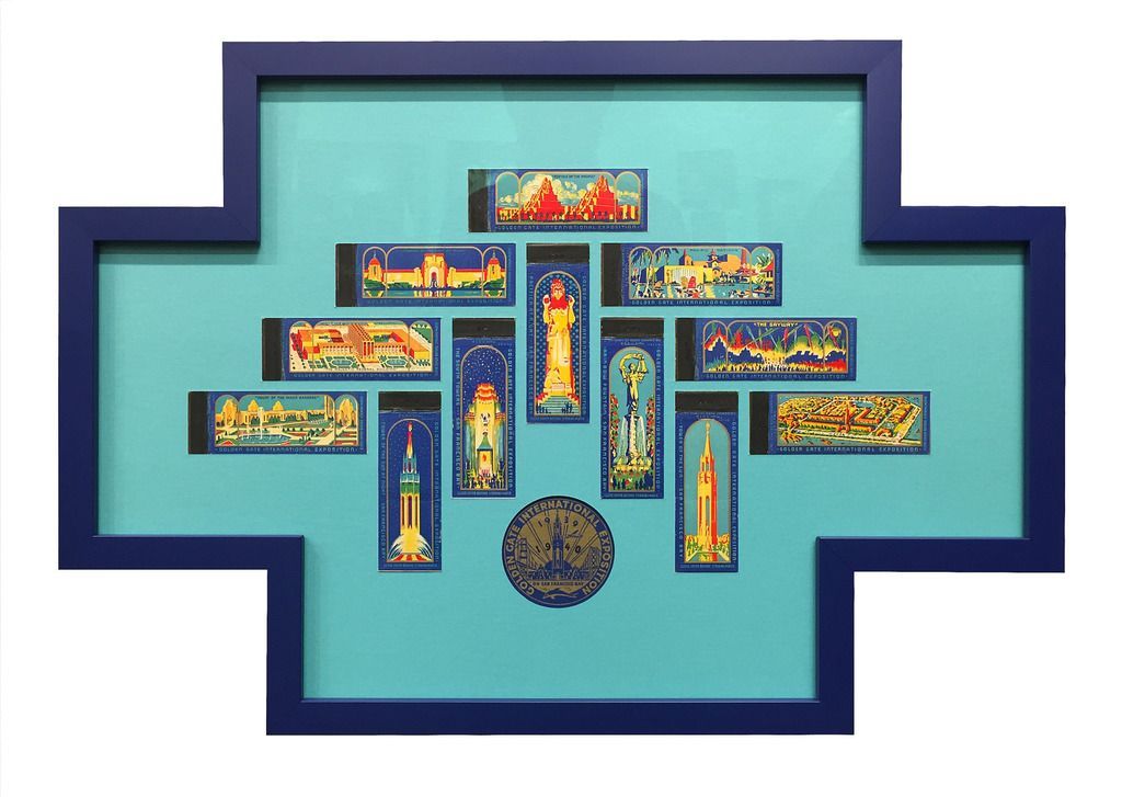 A painting in a blue frame on a white background