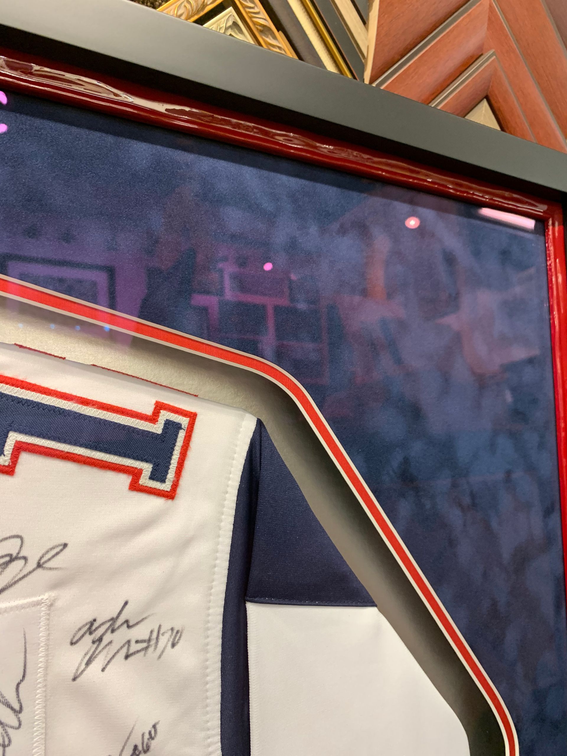 A framed jersey with the number 7 on it