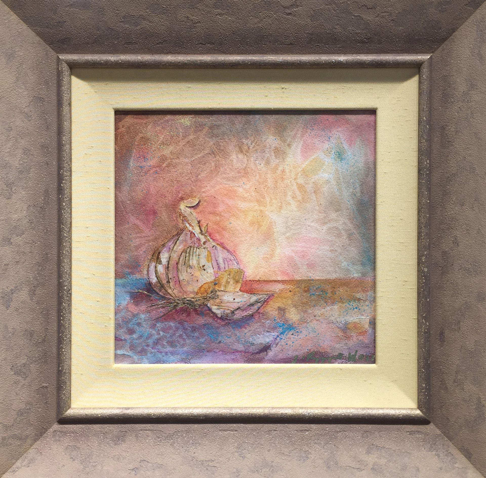 A framed painting of a garlic bulb on a table