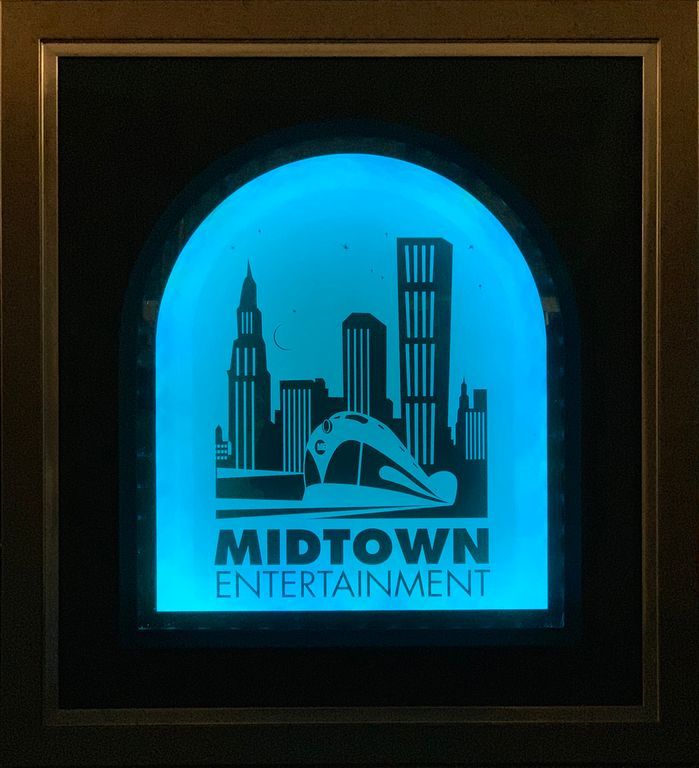 Sign that says Midtown Entertainment on it