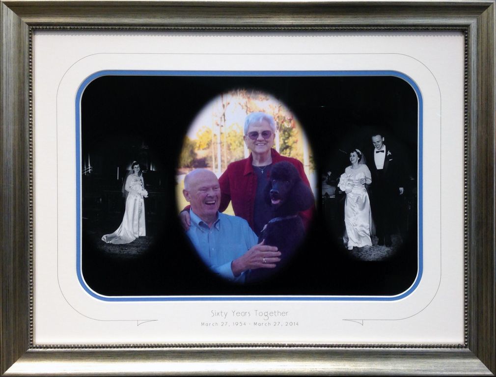 A framed picture of a man and woman standing next to each other
