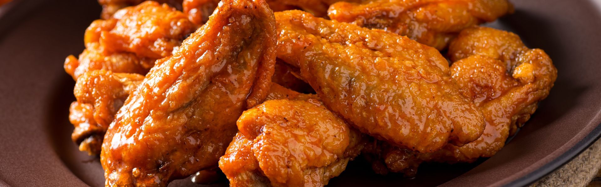 A plate of delicious buffalo style chicken wings