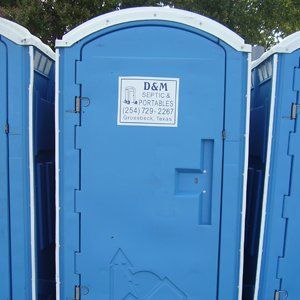 Blue portable toilet