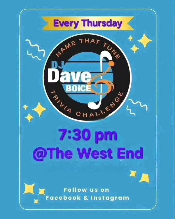 Person holding a plate with two French dip sandwiches, chips, and dipping sauces.