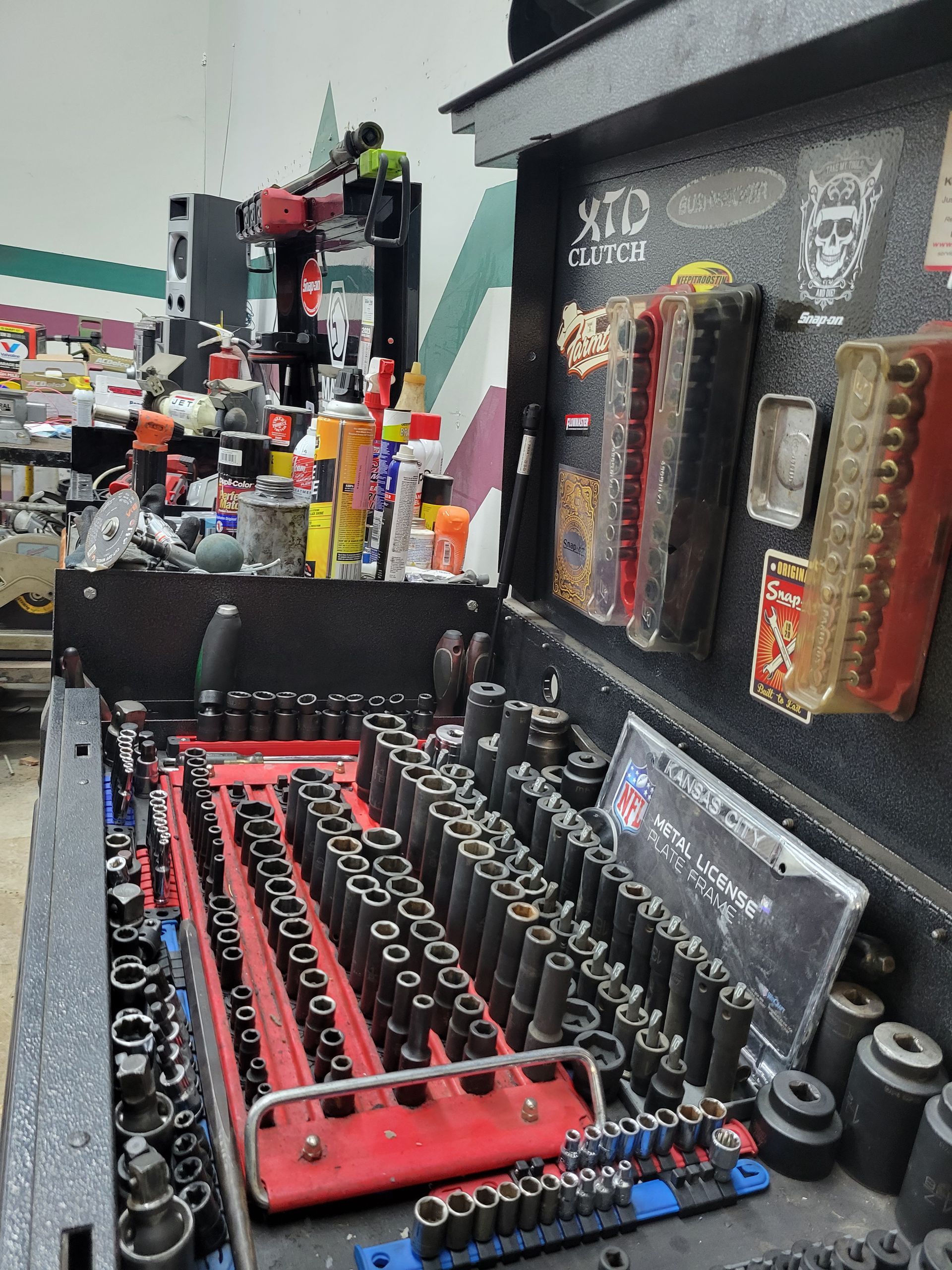 A bunch of tools are sitting on top of a table.