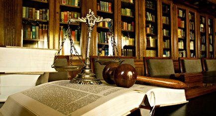 Gavel, scale and law books