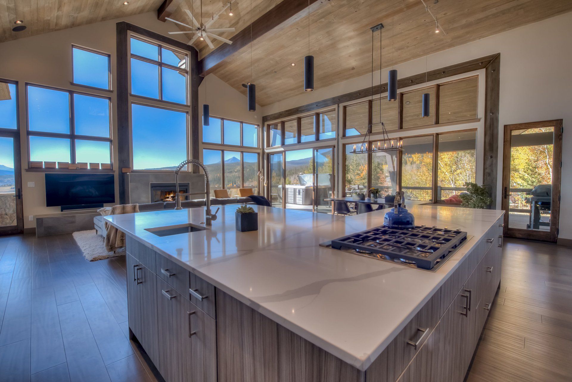 There is a large island in the middle of the kitchen.