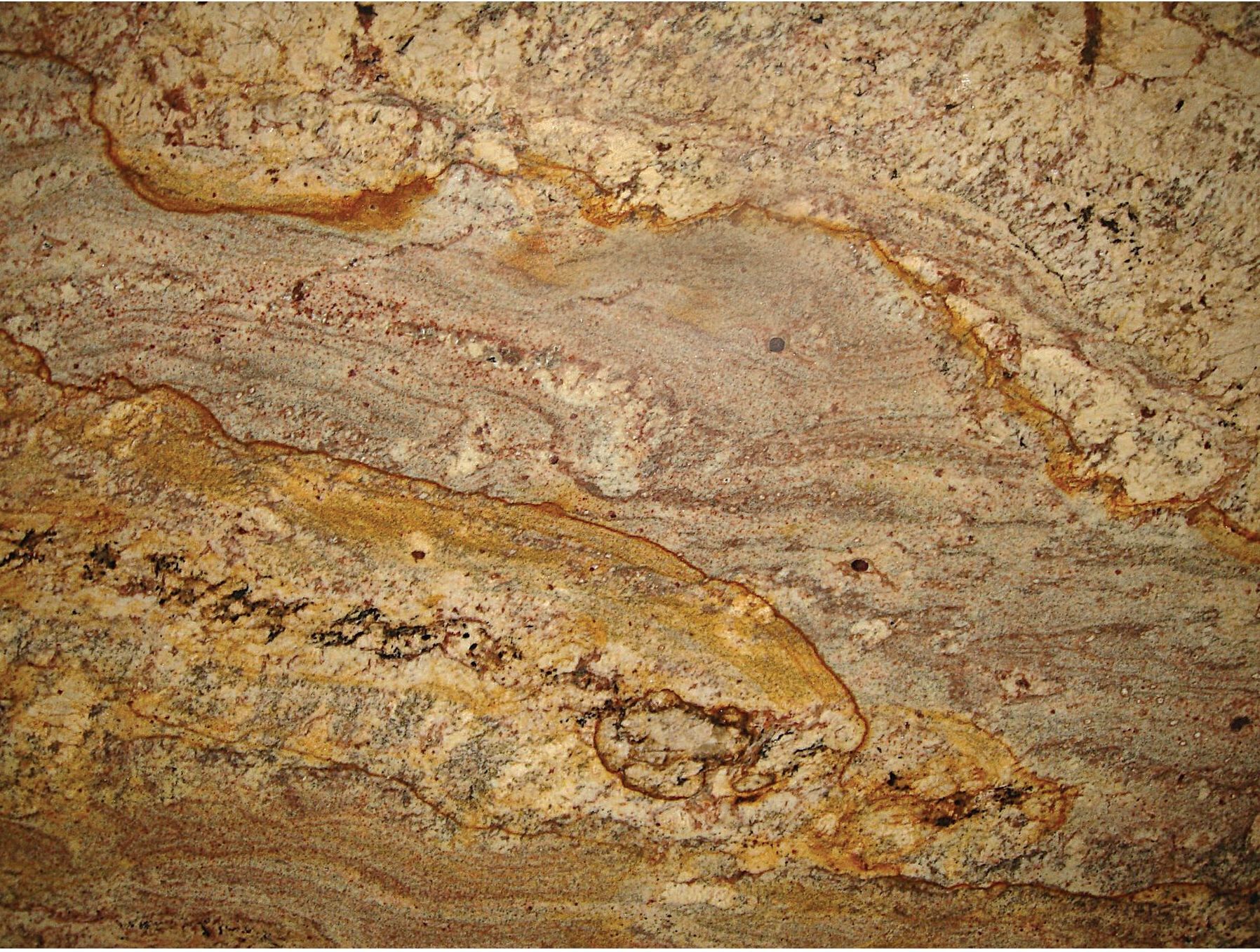 A close up of a granite counter top with a marble texture