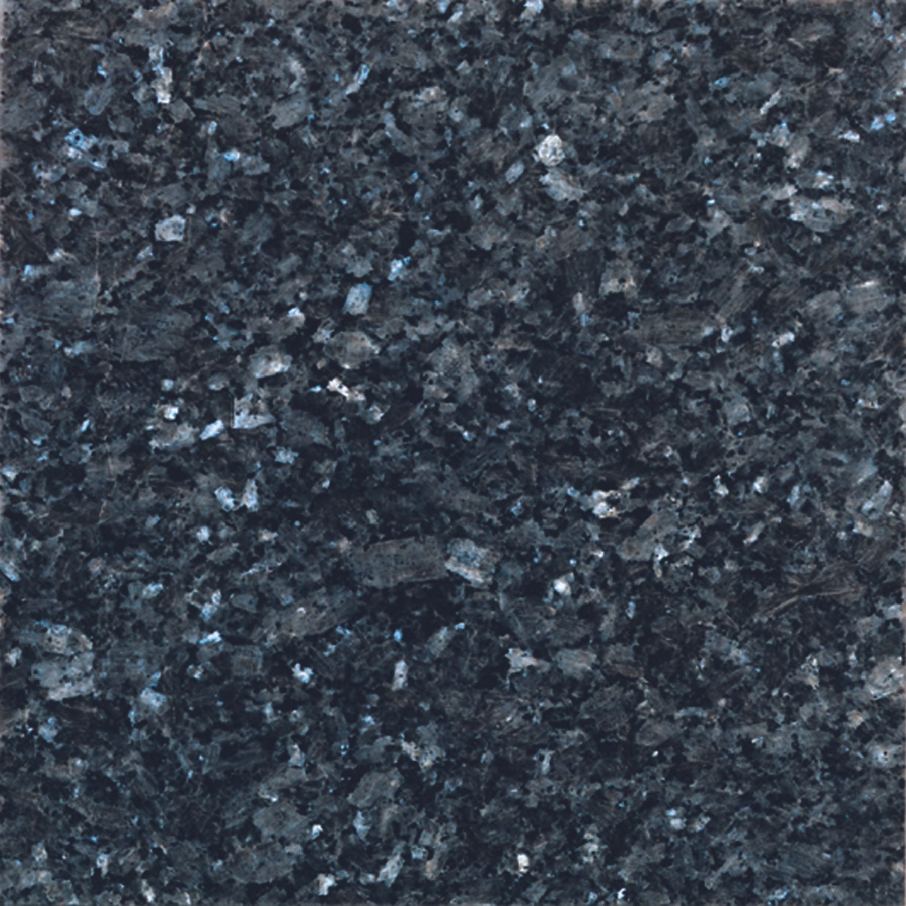 A close up of a black granite counter top