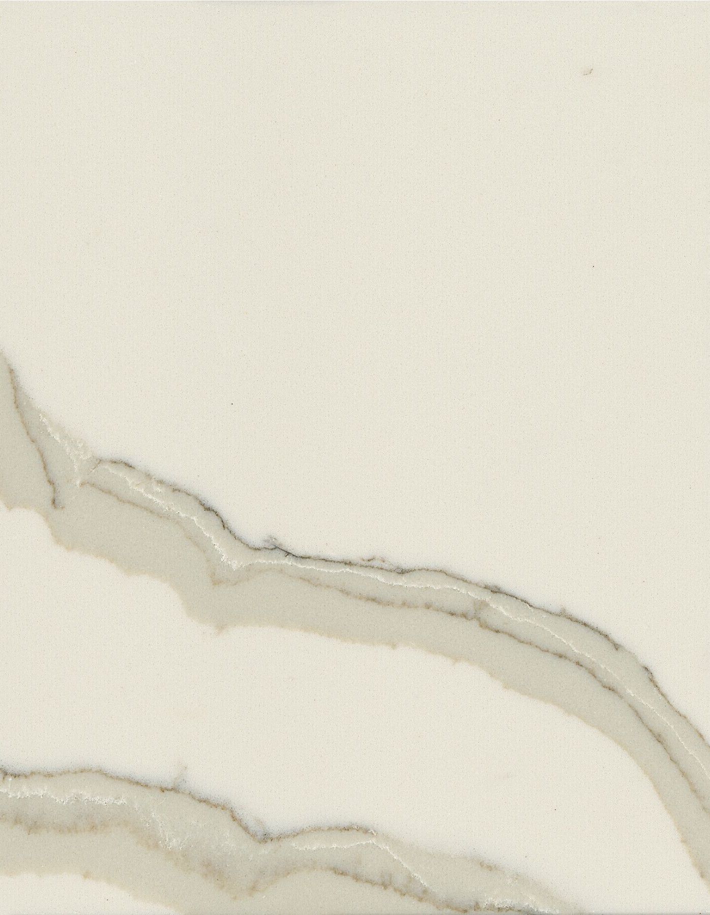 A close up of a white tile with a gray stripe on it.