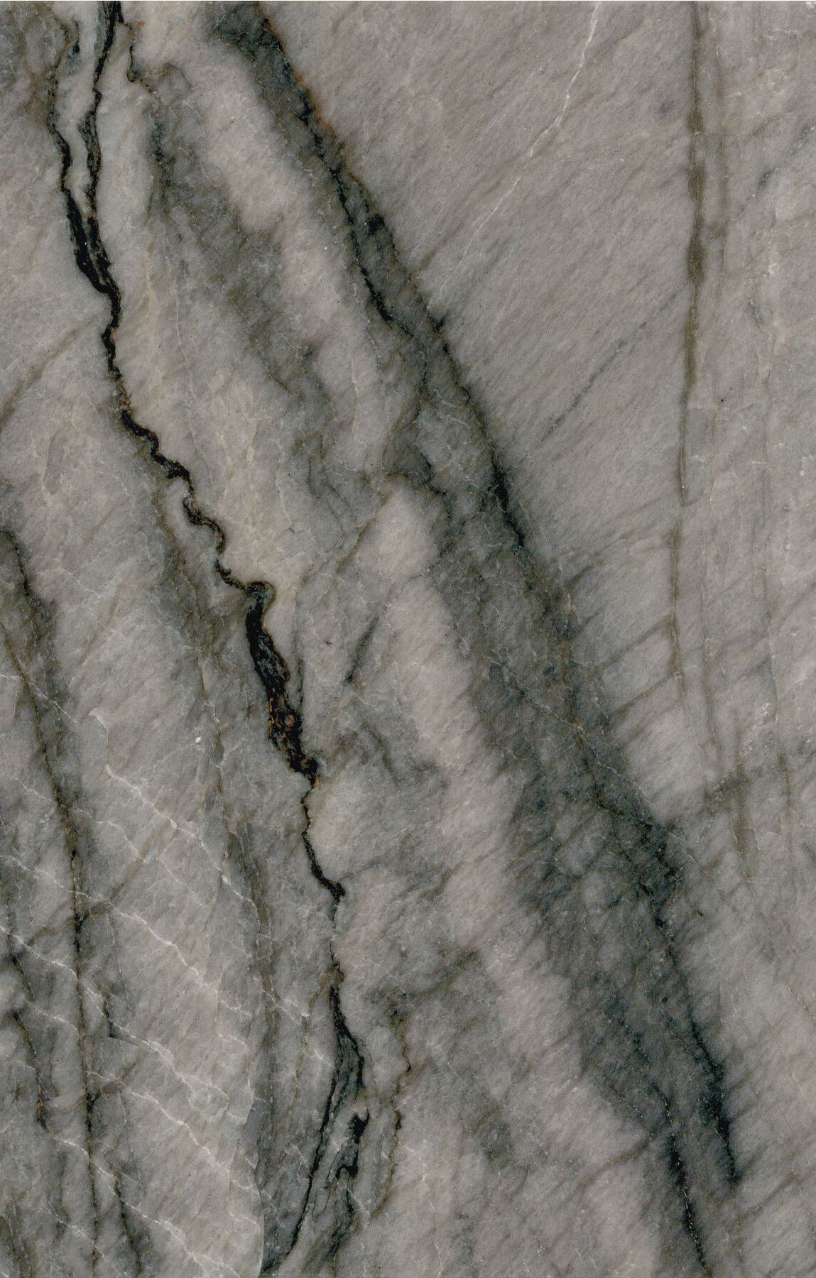 A close up of a marble surface with a gray and black marble texture.
