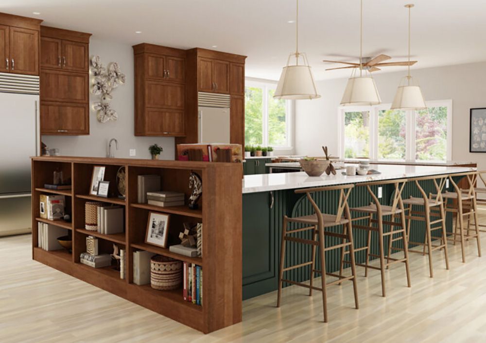 Modern kitchen with dark green island, wood shelving, pendant lights, and barstools by a bright window.