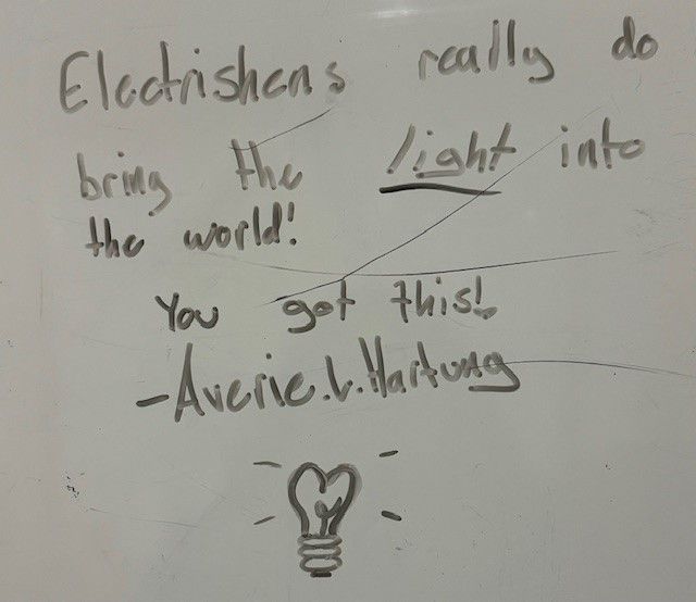 A white board with the words