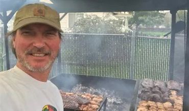 Learn More About Catering Happy man cooking barbecue