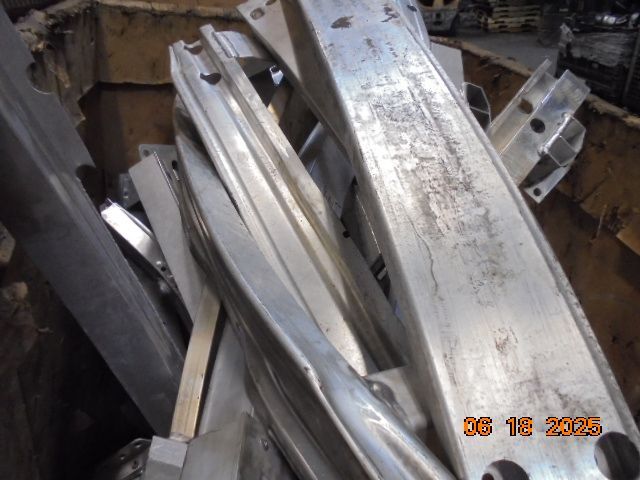 Scrap aluminum pieces in a bin