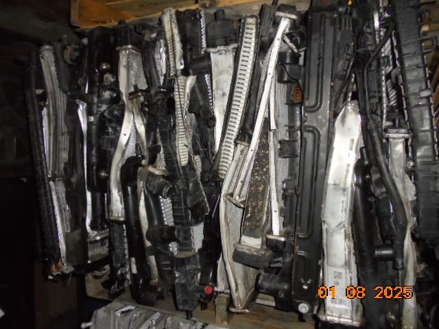 Stack of used car radiators