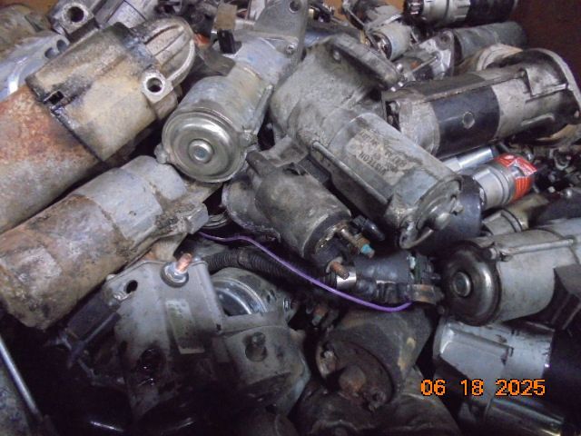 Pile of used car starters