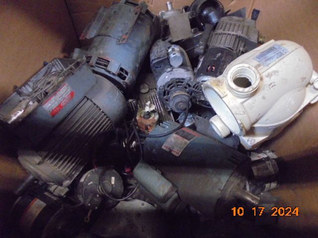 Pile of electric motors in a box