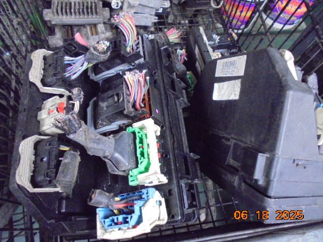 Basket overflowing with car wiring components