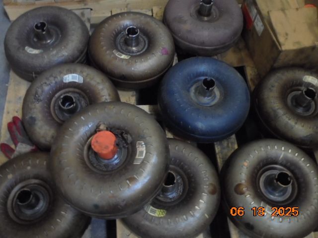 A pile of used torque converters