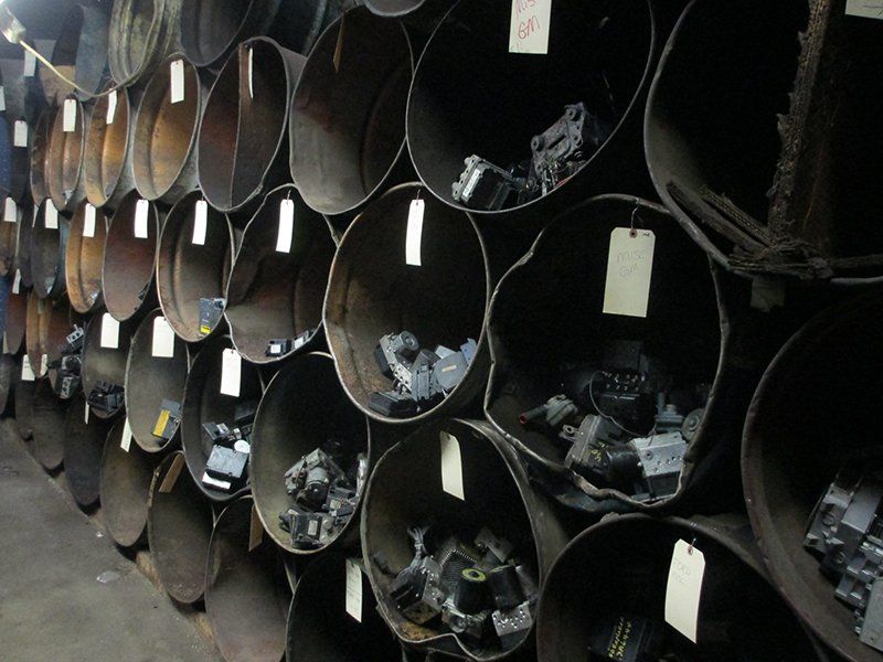 Scrap metal in round bins