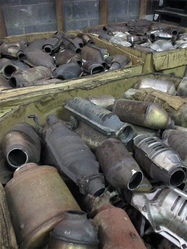 Scrap catalytic converters in wooden bins