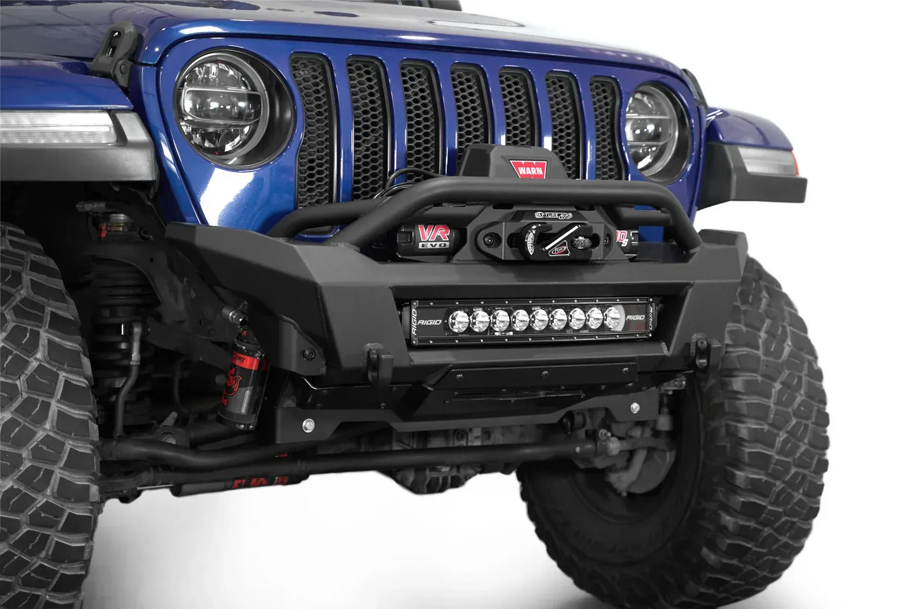 Blue Jeep front with off-road bumper, winch, and LED light bar on a white background