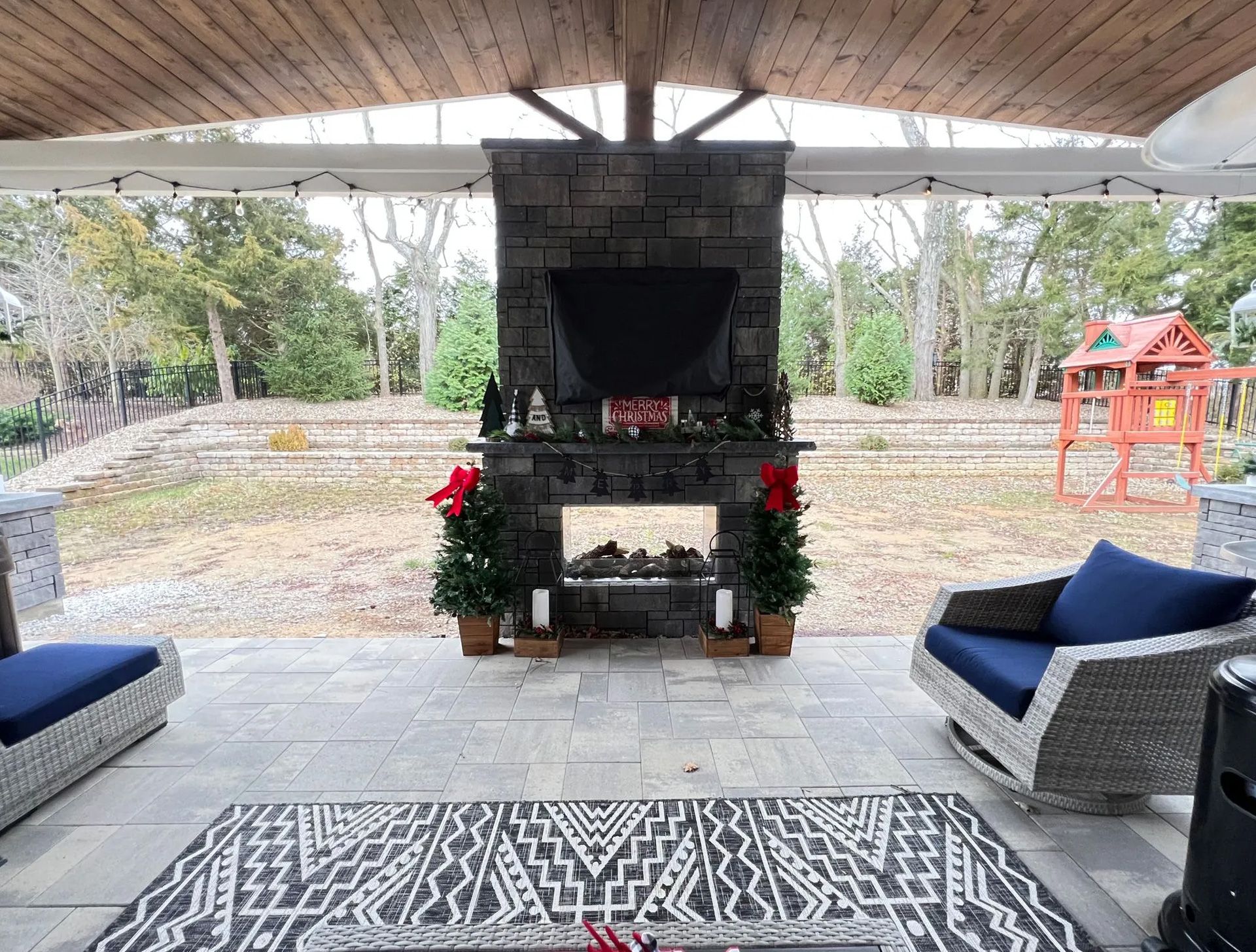 There is a fireplace in the middle of the room.