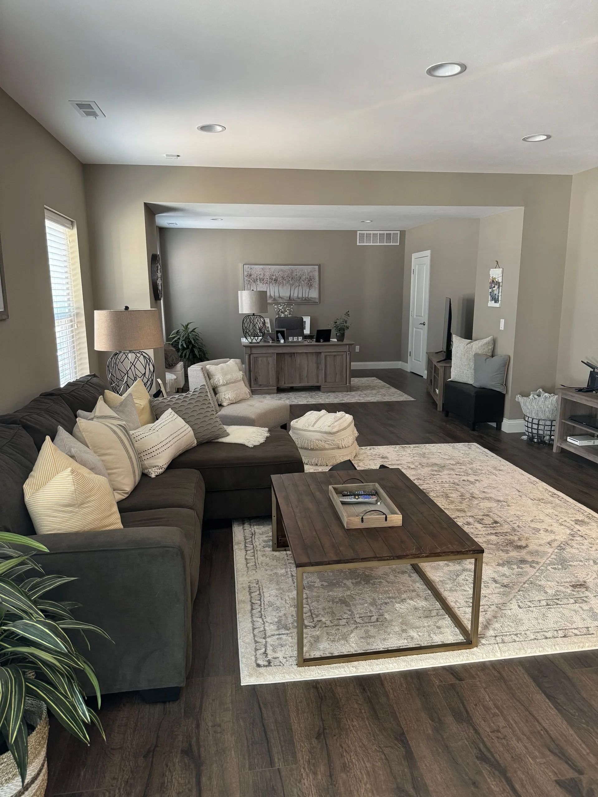 A living room with a couch and a coffee table