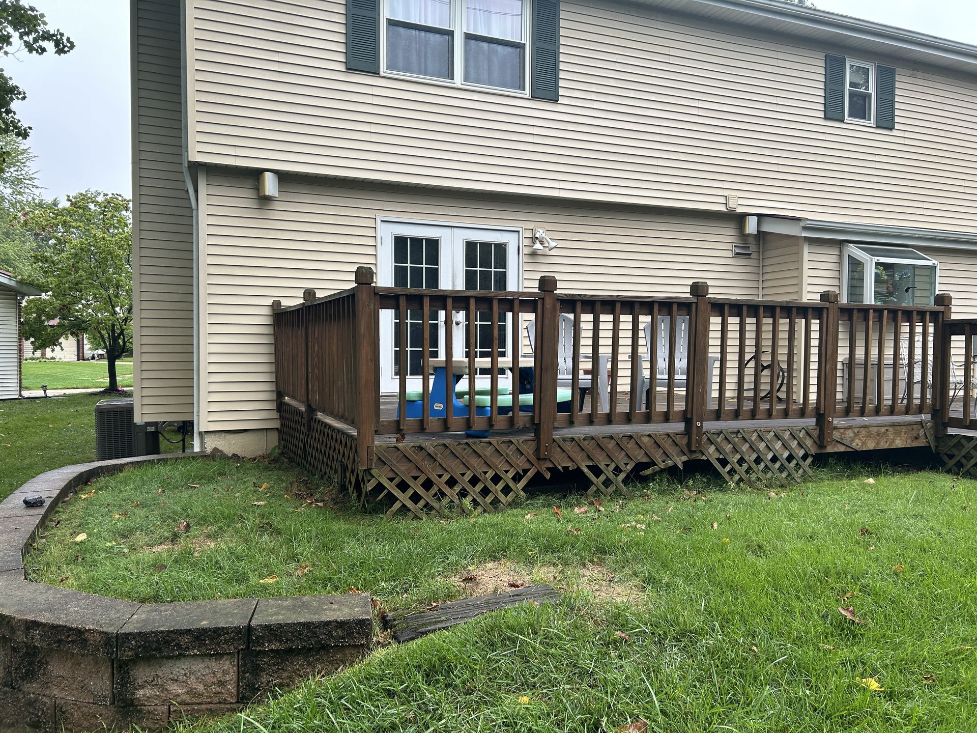 An old wooden deck with stairs