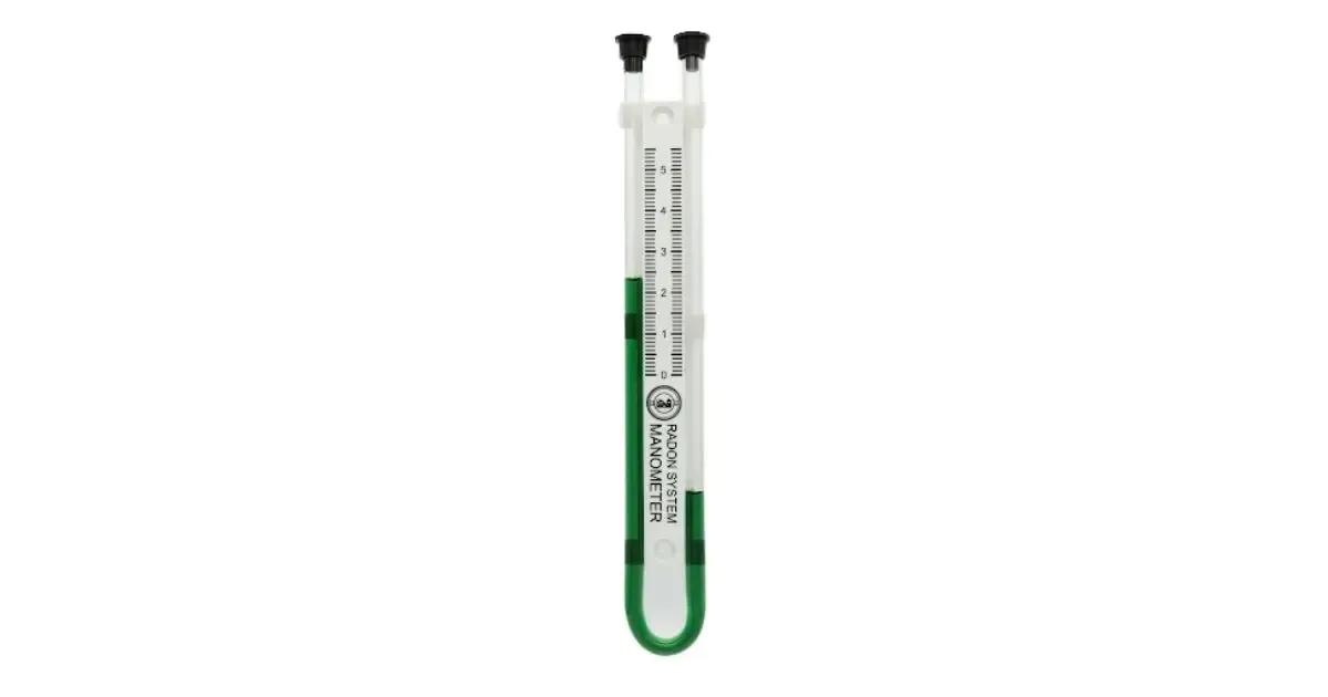 Clear U-shaped glass tube with green liquid, mounted vertically on a white background