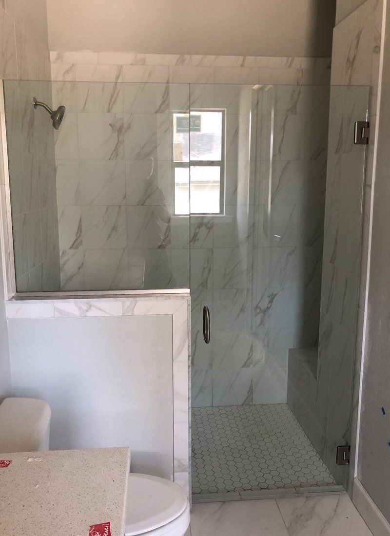 Frameless shower door