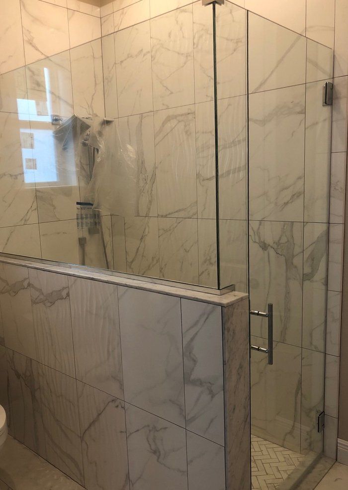 Frameless shower door