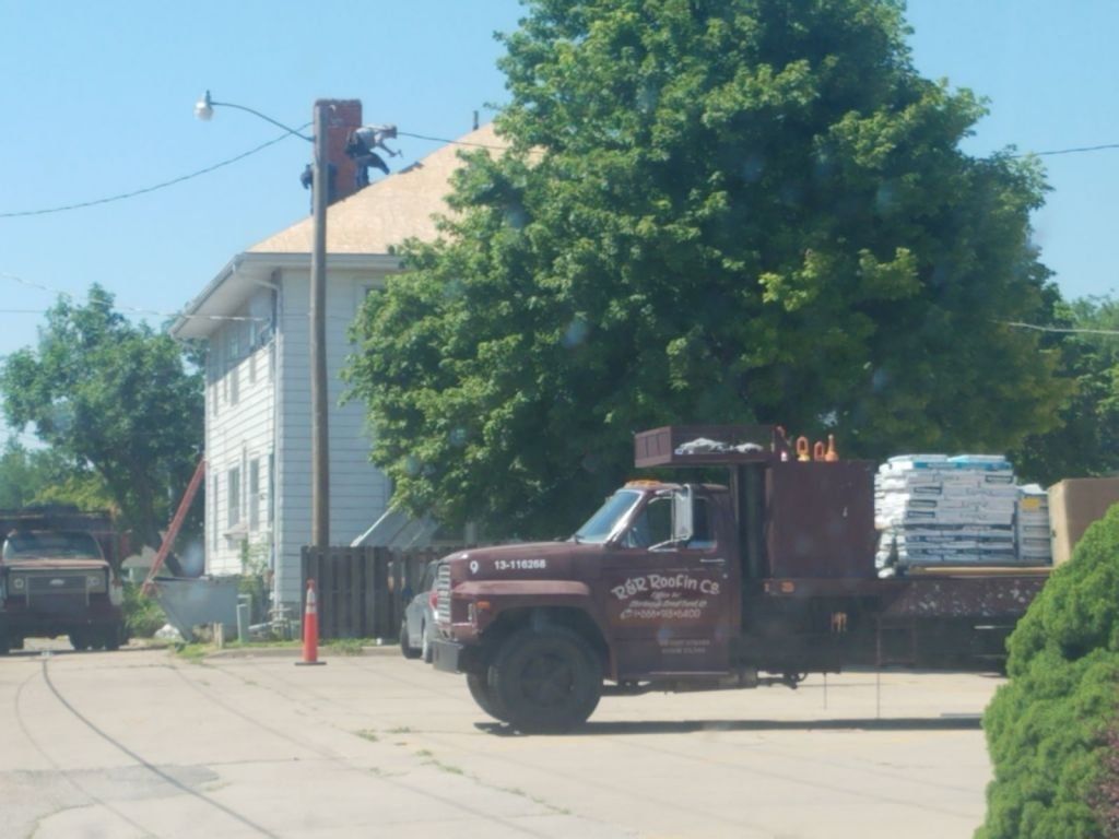 A red truck with the word delivery on it