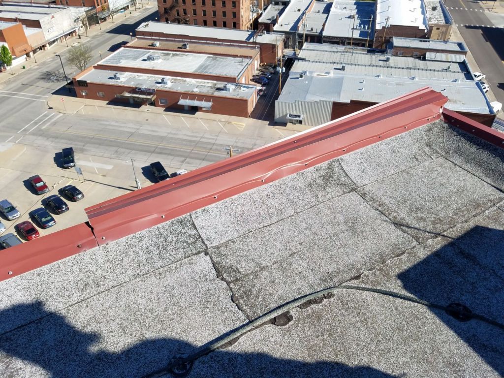 An aerial view of a city from the top of a building.