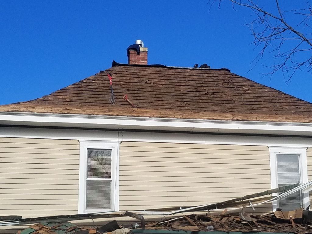 A house with a chimney on top of it
