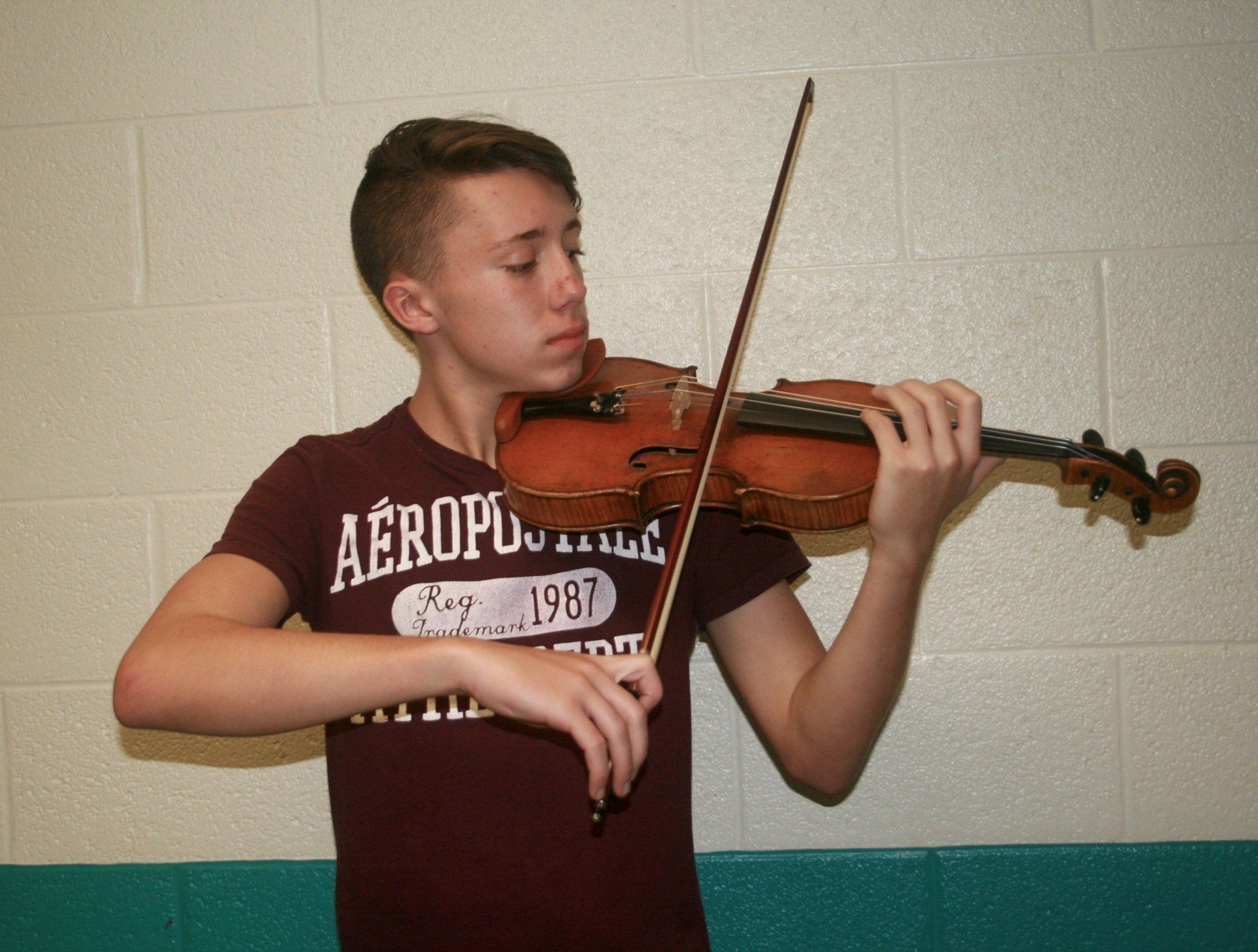 Boy playing violin