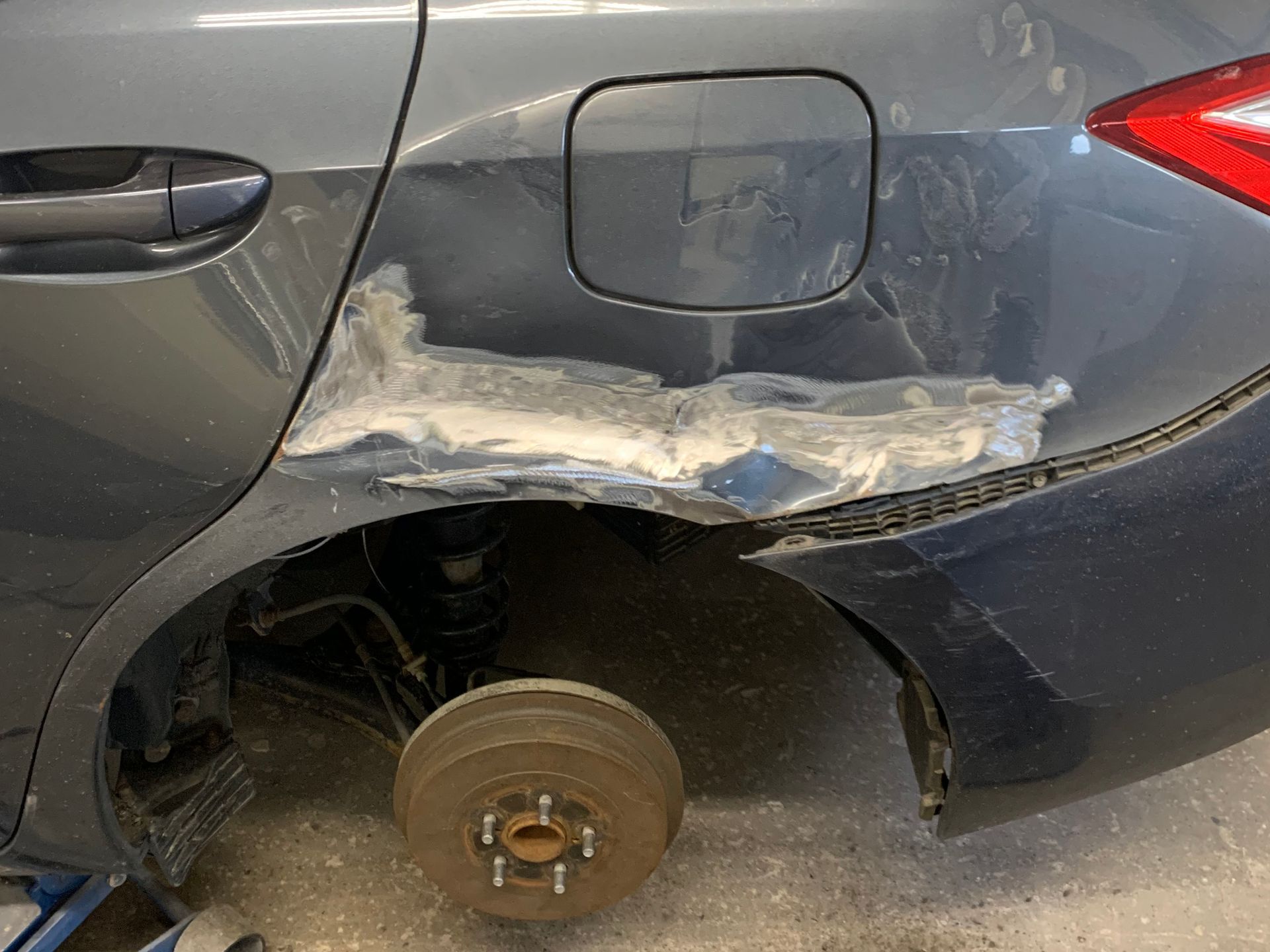 before - dark gray sedan