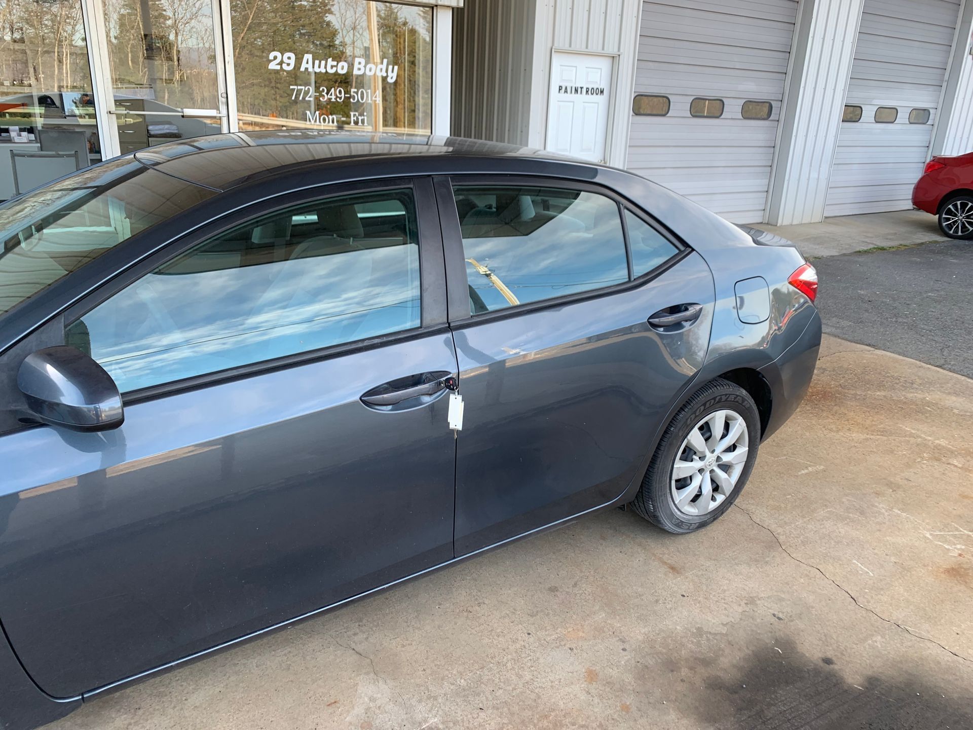 after - dark gray sedan