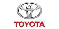 Toyota logo: Silver oval with three overlapping ovals, above red text