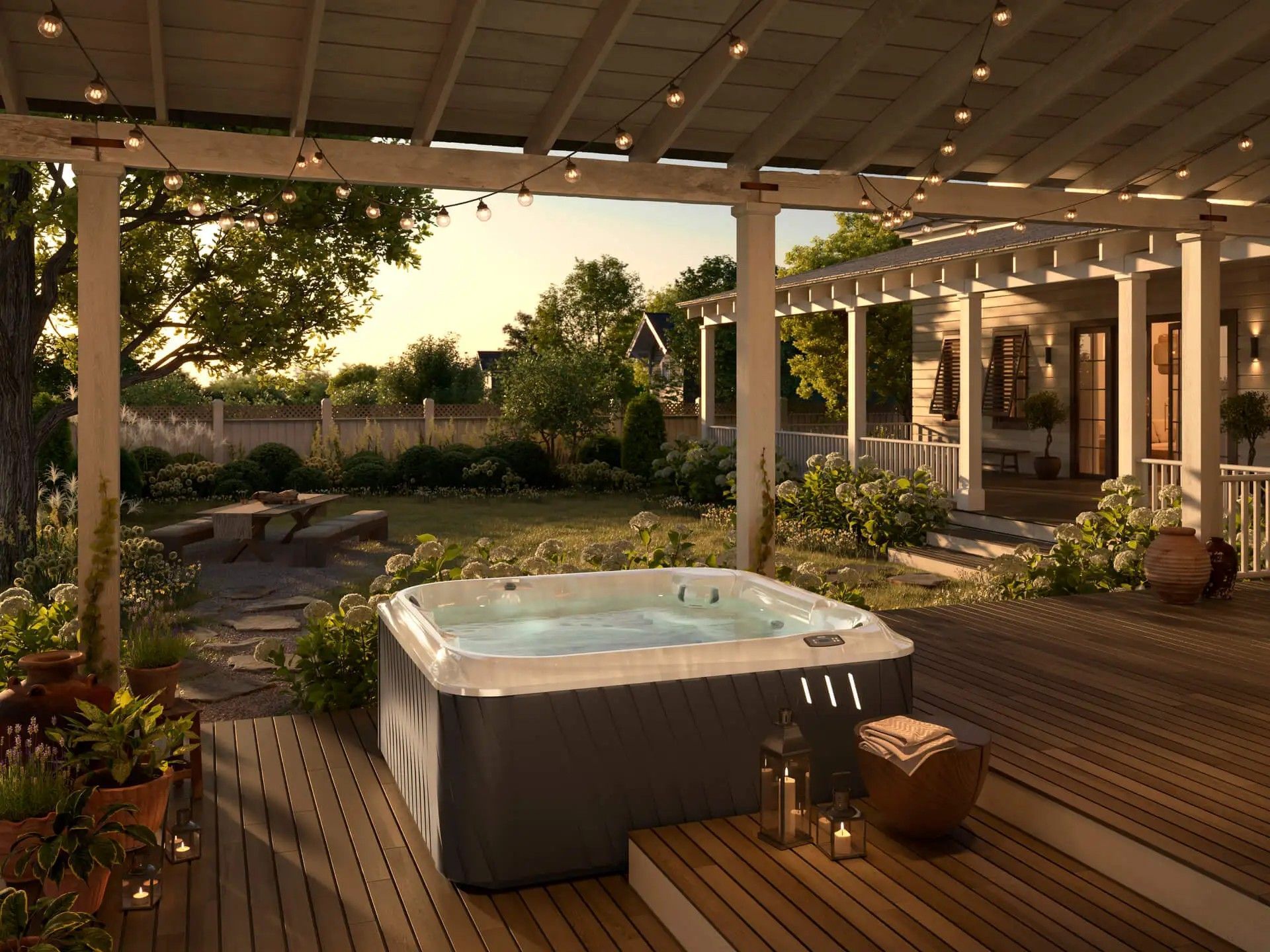 A hot tub is sitting on a wooden deck under a pergola.