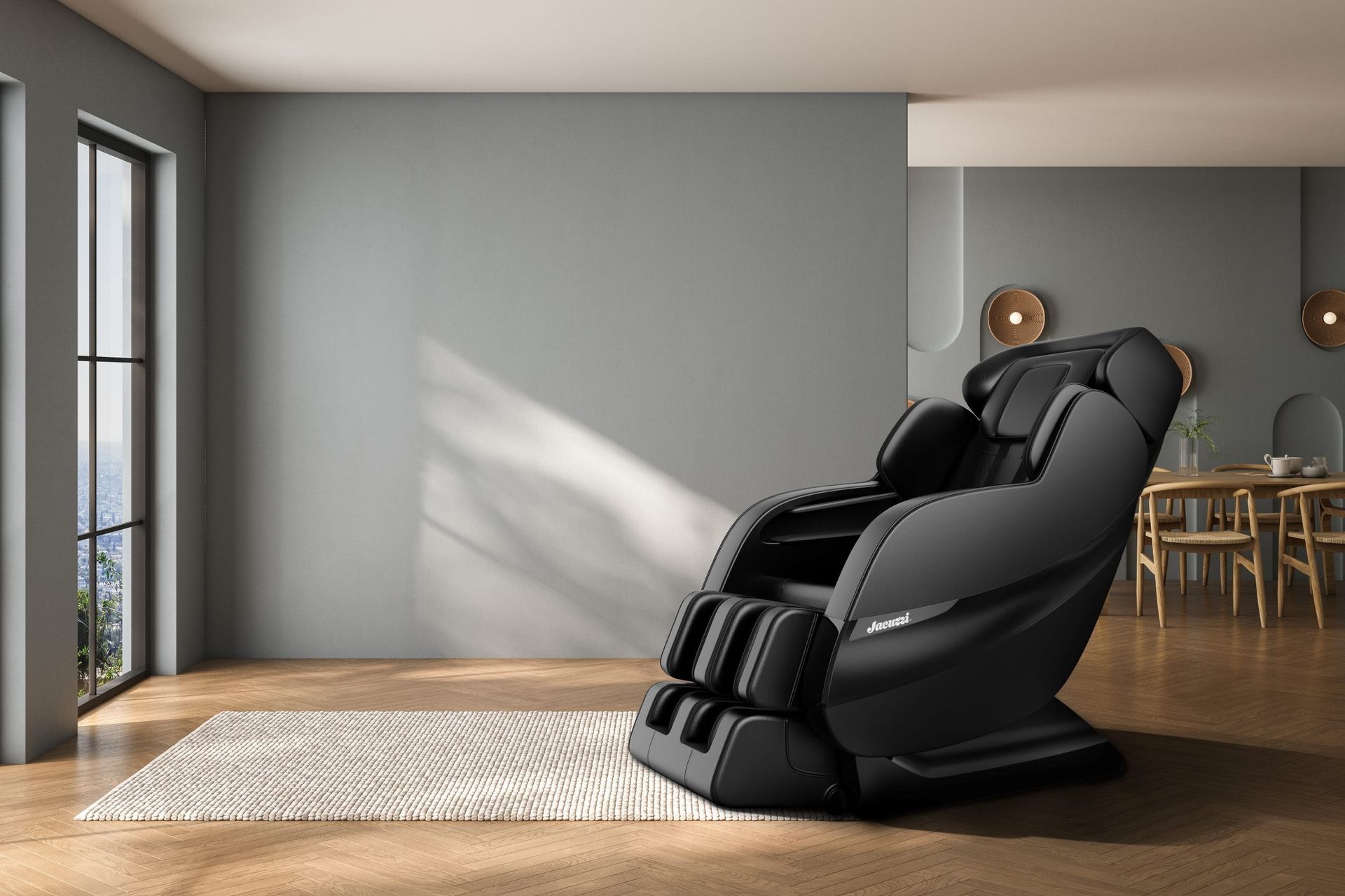 A black massage chair is sitting in a living room next to a window.