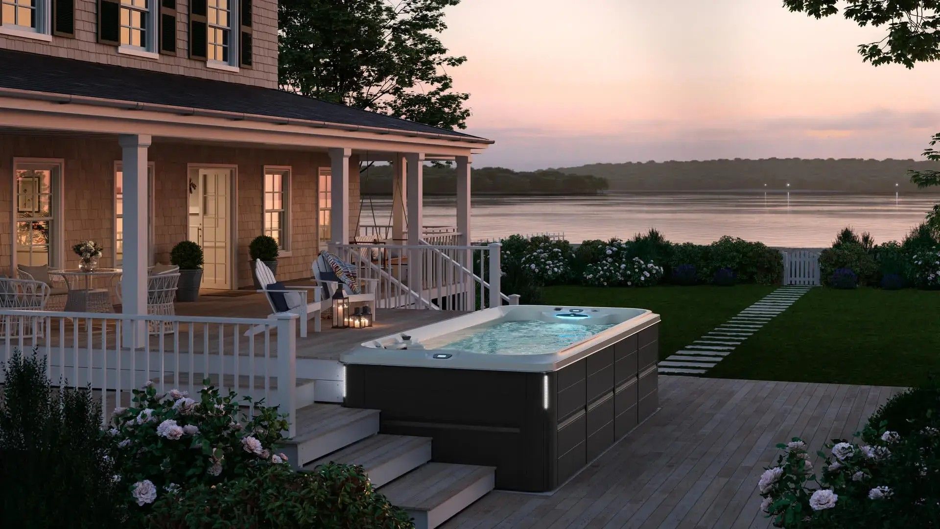 A large hot tub is sitting on a deck next to a house.