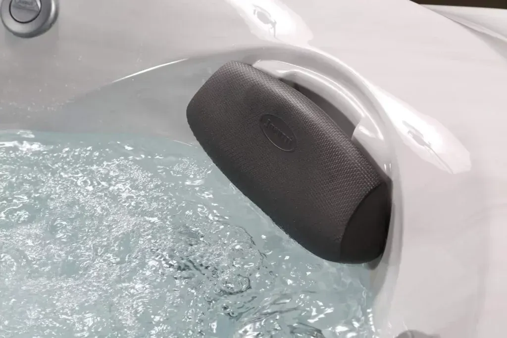 A close up of a hot tub with bubbles coming out of it