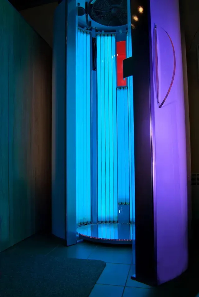Person pouring salt from a clear pouch into a metal container
