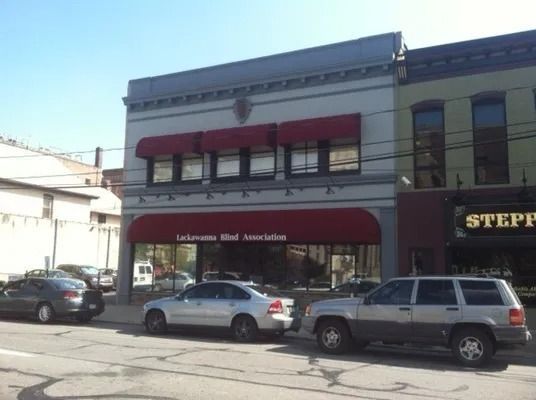 Building with red awnings, 