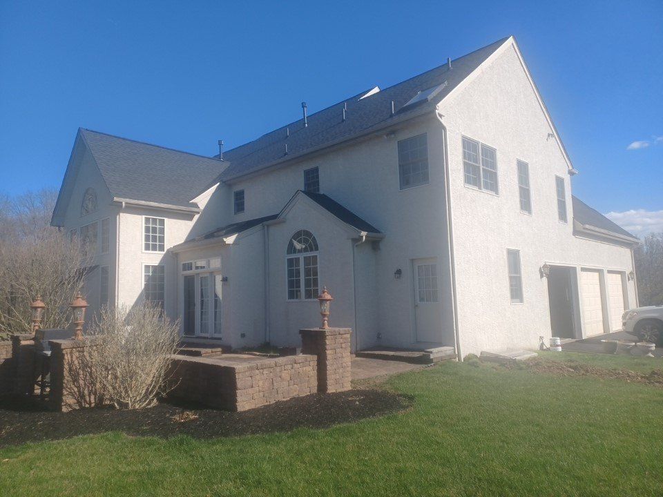 Side view of a house with no siding
