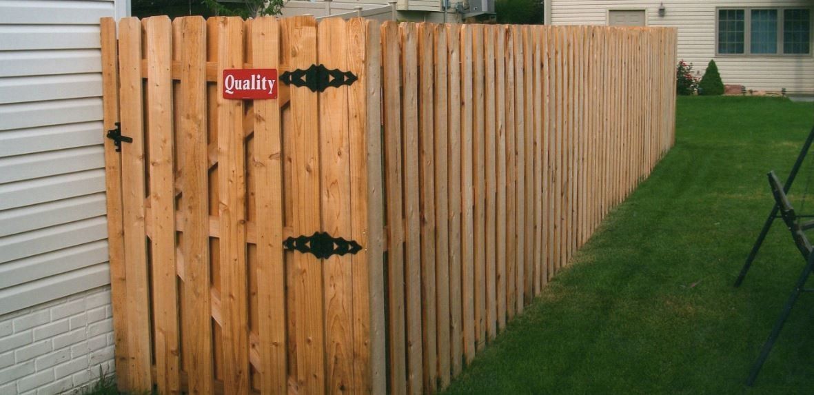 Wooden fence with gate, 